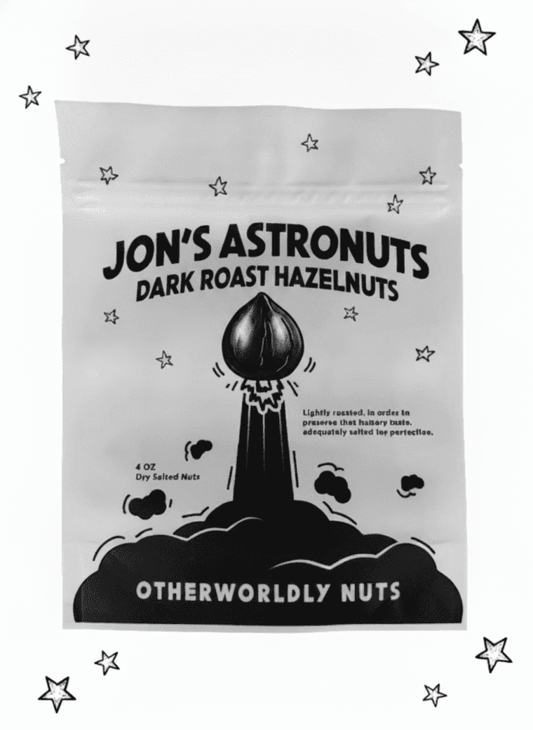 Jon's Astronuts dark roast hazelnuts pouch — black-and-white, dark roasted nut on the rocket
